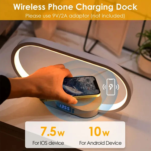 Phone charging wirelessly on the bedside lamp base