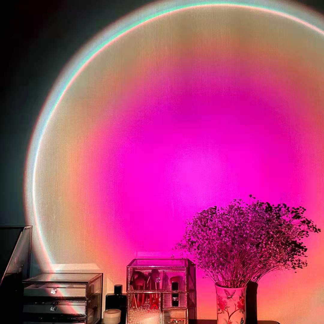 Sunset projection lamp casting a warm glow